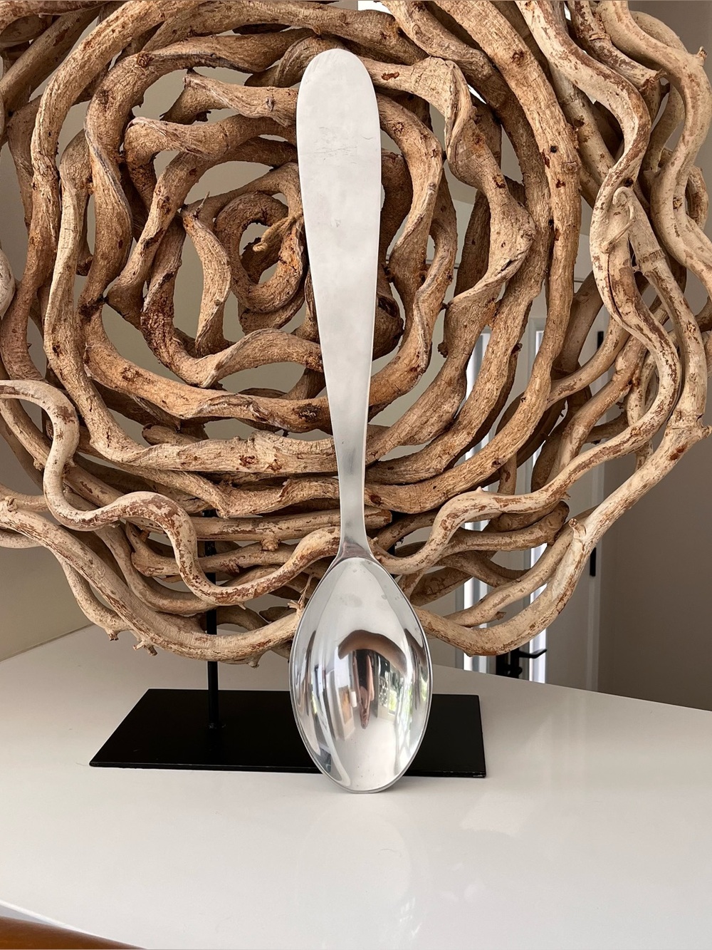 Large silver spoon hanging wall decoration
